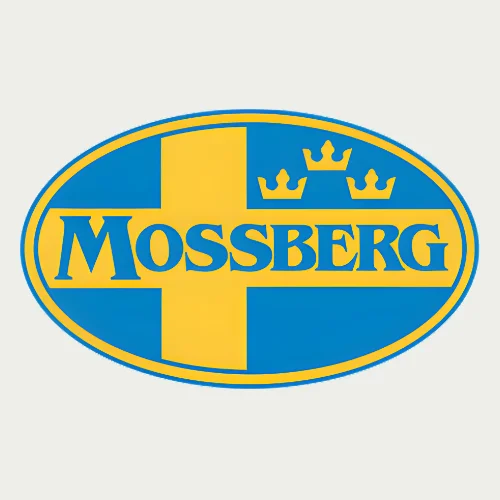 Blue and yellow oval Mossberg logo featuring a yellow cross, three yellow crowns, and the word "MOSSBERG" in blue capital letters across the center.